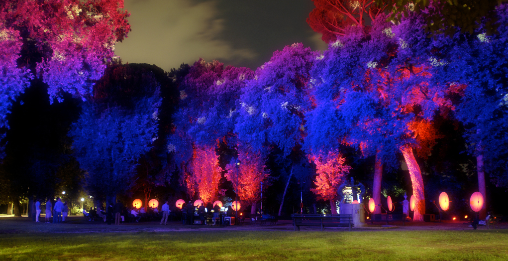 Setup of 16 Holophones in Villa Borghese, Rome, showing parabolic loudspeakers arranged for precise spatial audio diffusion in an acousmatic composition.